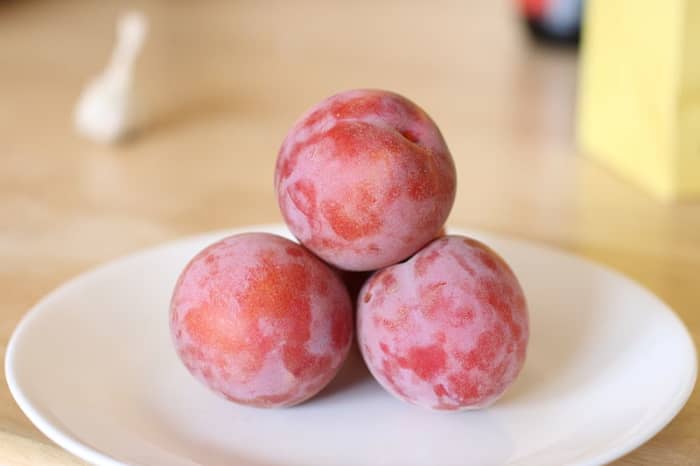 A peacotum is a peach/apricot/plum hybrid, said to taste similar to fruit punch, trademarked by Zaiger's Genetics, a company that develops novel fruit through deliberate hybridization.