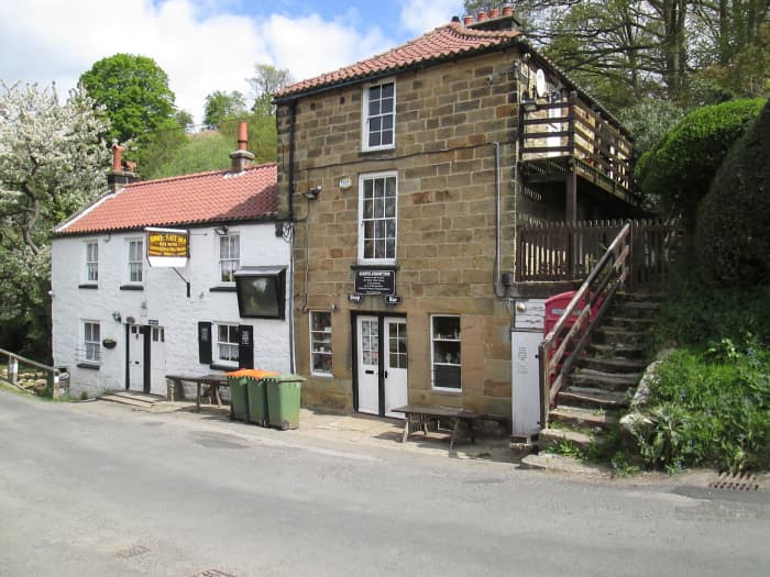 There might be an inn somewhere on your railway. This is the Birch Hall Inn at Beck Hole near Goathland. The inn is beside the River Murk Esk and close to the original railway route of George Hudson's Whitby & Pickering Railway