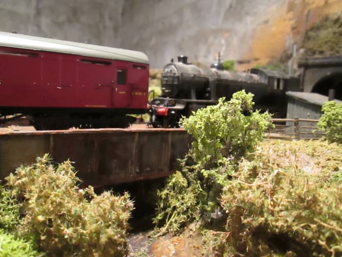 Create a scene: look at preserved railways or wherever your models are based and take in the landscape, natural or engineered. Your trains should look as if they are part of a whole