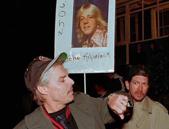 Families of victims and potential victims gathered outside of San Quentin prison the night of William Bonin’s execution on February 23, 1996.