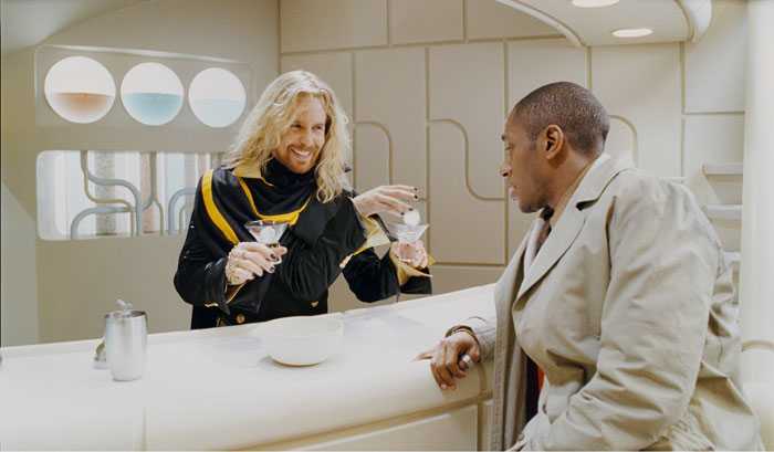 Science Officer PI 3.1417hub1417hub, cleverly disguised as a bartender, interviews a local - photo credit: fanpop.com
