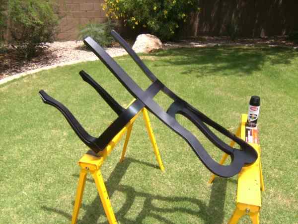 I set the chair on saw horses to spray paint the back and sides. When the final coat was dry, I set the chair upright and painted the front.