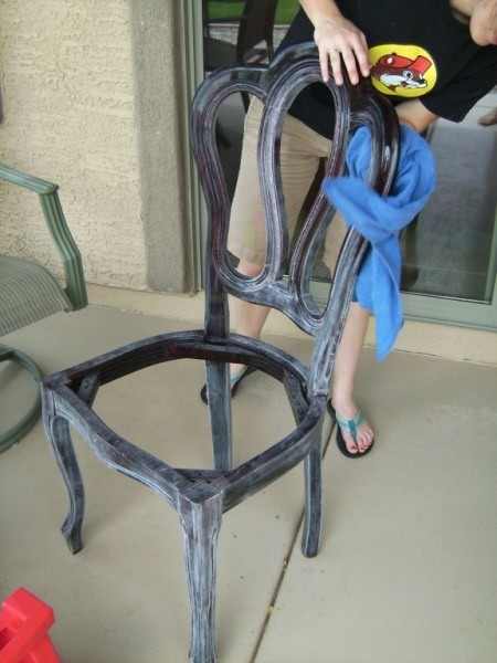 Notice the finish has been sanded all over. Wiping the chair with a damp rag removes the dust left from sanding.