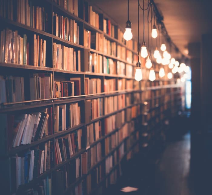 I spent many nights at the University of Washington surrounded by dusty bookshelves much like this one, while working on my reading and homework during the completion of my degree.