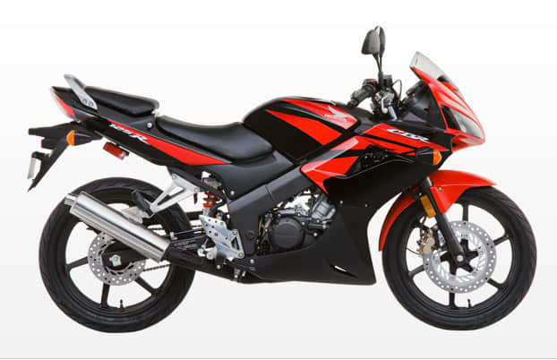 Waaaaaay down on the price scale from the Husky and Aprilia, this 2009 Honda CBR125R is still one buck under three grand!