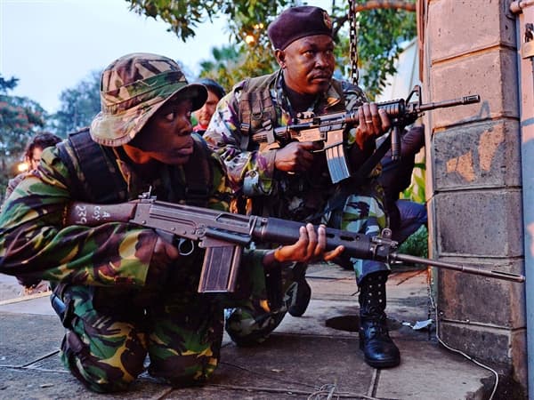 Gunmen stormed a crowded shopping mall frequented by Westerners in brazen midday attack