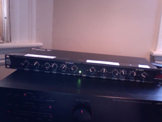 DBX active crossover. The white tape on the top makes it easy to see which knobs adjust the crossover points, and which adjust the gain for each channel