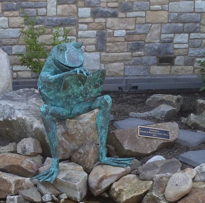 This frog with a book is in the garden at the Ellicott City Branch of the Howard County Library System. When I worked at the Towson Branch of BCPL in Maryland, there was a large tortoise statue in the children's area. Children loved to sit on it.