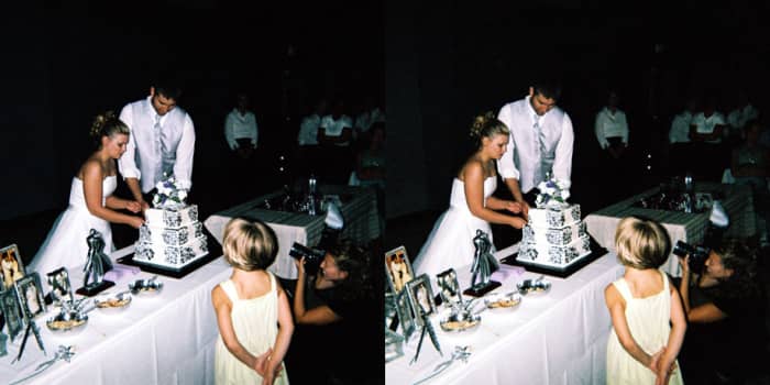 My brother took this picture of my wife and I cutting our cake. Cross your eyes and you will feel like you were there. (click for larger) Photo by Darin Flannery