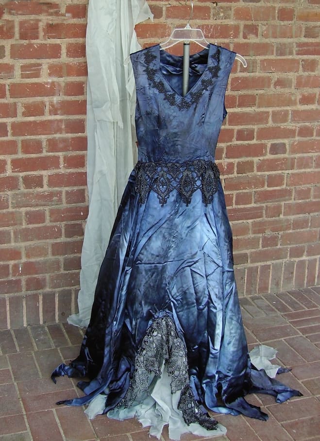 I put this on my dress form stand to try to get a better pic of the front of the whole dress, but I needed a taller one!