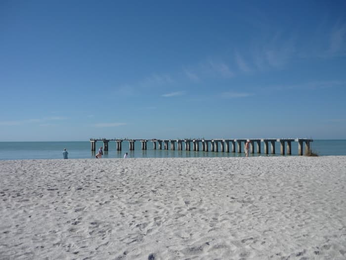 The skeleton of the old Florida Power and Light pier -- now a favorite roosting spot for hundreds of pelicans and other sea birds. Can you see them? -- those dots on top.