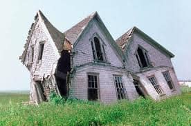 White ants can easily destroy an entire building, see what has happened to this one, they have eaten all the wood inside and now the whole lot is collapsing