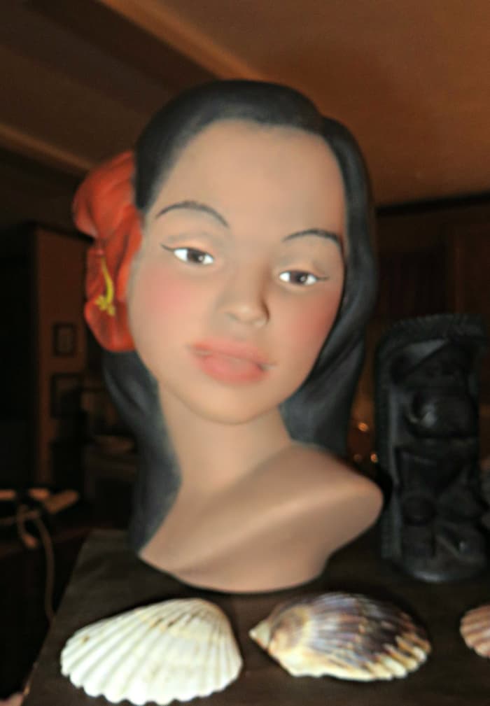 She is about eight inches tall, and is much like the Marwai type Polynesian busts of that era. She is made of fine porcelain and there are no chips or cracks.