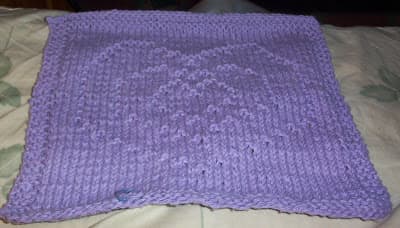 A beautiful purple heart pattern, but you can knit it for your sweetie in whatever color you desire!