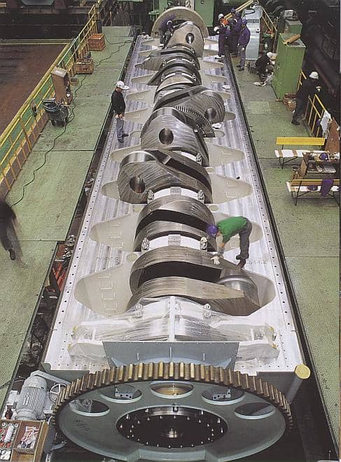 The crankshaft of worlds biggest engine the crankshaft translates reciprocating linear piston motion into rotation. Compare its size with the size of the man.