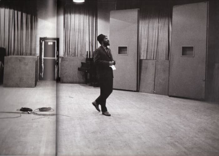 Monk wistfully waltzing around the studio. This picture of Monk listening to the playback was taken around 1962 or 1963.