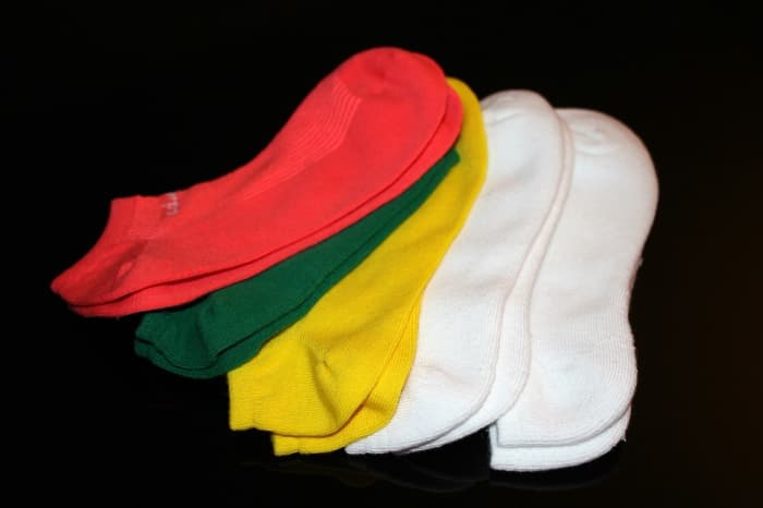 A laundry net or pillow case will keep your socks from going astray, as so often happens in the washing machine.