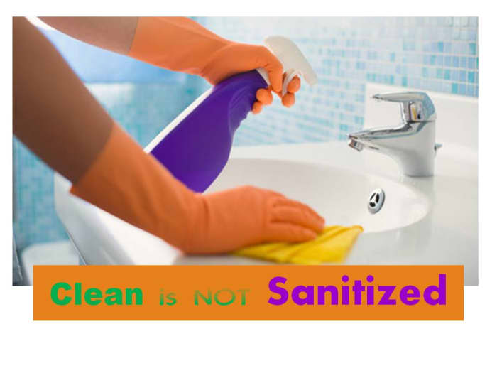 colorful poster with orange rubber gloves and purple spray bottle with the words "clean is not sanitized"