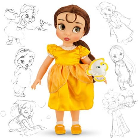 Belle was originally released in her blue and white dress from the beginning of the movie, but that was later changed to her yellow gown.