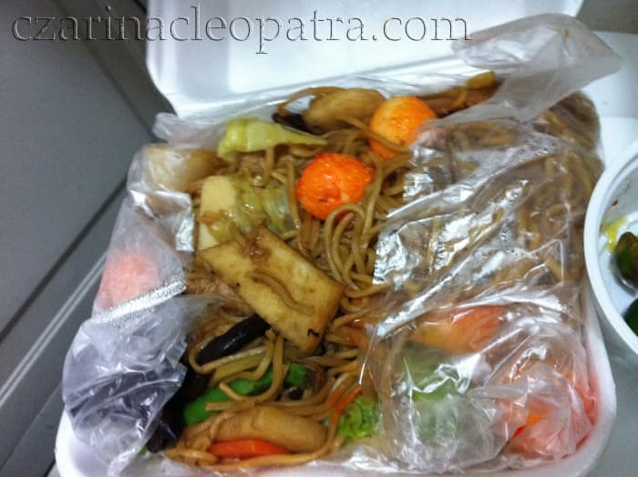 This take-out pancit canton was cooked with browned whole squid balls and shreds of dark wild mushroom. Hiding beneath the transparent sheet were a couple of whole shrimp and slices of meaty sausage. Just imagine the satisfying burst of flavors!