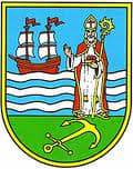 This is the city seal of Komiža, where Saint Nikola is the patron saint, celebrated on 6 December. He is the protector of both children and fishermen.