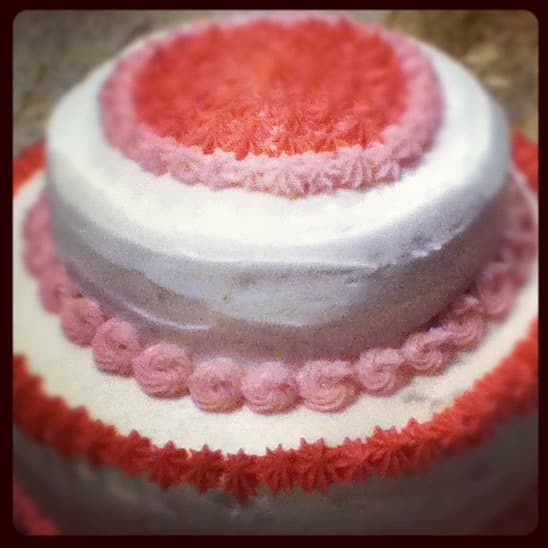 Make your own frosting for birthdays, Mother's Day and other holidays using homemade food dyes. This cake was made using raspberries to make light pink frosting and blackberries to make the bright pink frosting.