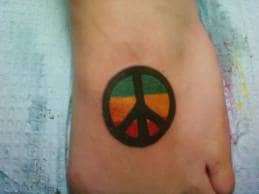 Peace Sign Tattoo And Peace Sign Tattoo Meanings-Peace Sign Tattoo