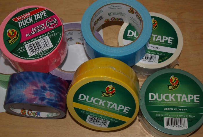 An assortment of Duck® Tape in some of the more than 25 colors, patterns, and college logos available today.