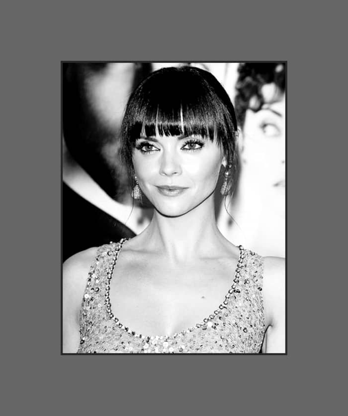 Christina Ricci's hairstyle with long cropped bangs rocks! Christina knows how to wear bangs that will flatter her heart shape face - 2013 Hairstyles with Bangs for Round, Oval, Square, Heart, Oblong Face