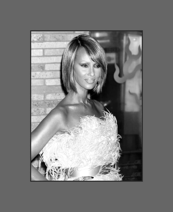 Fashion model Iman (David Bowie's beautiful wife) looks stunning! Her bob hairstyle with long side-swept bangs is very flattering on her oblong face - 2013 Hairstyles with Bangs for Round, Oval, Square, Heart, Oblong Face