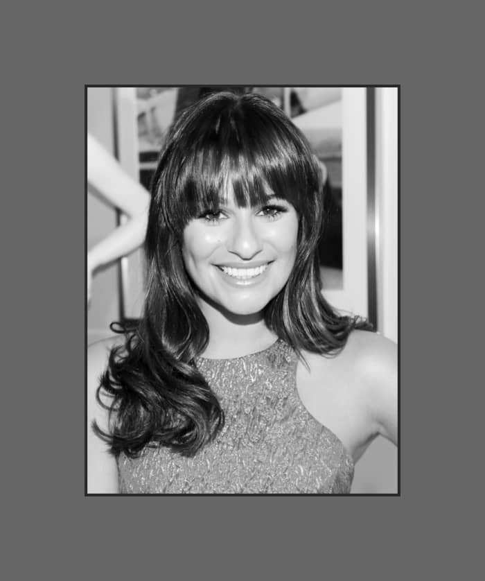 Glee star Lea Michele's hairstyle with long cropped bangs looks flirty and fun. Very fashionable hair style for square faces - 2013 Hairstyles with Bangs for Round, Oval, Square, Heart, Oblong Face