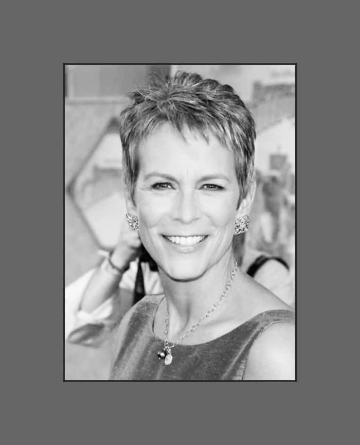 Jamie Lee Curtis looks gorgeous! Her famous grey pixie hairstyle with short cropped bangs is very flattering on her oblong face - 2013 Hairstyles with Bangs for Round, Oval, Square, Heart, Oblong Face