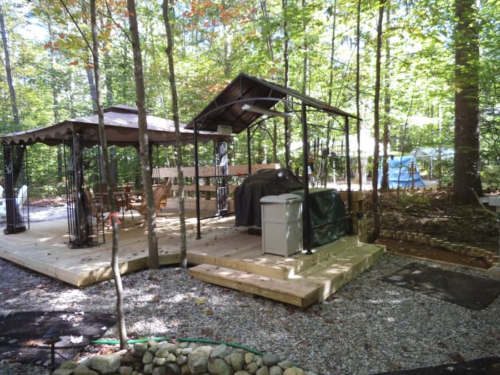 Here's the section of the deck where the grill gazebo went. He even has 2 grills and a trash bin under cover.