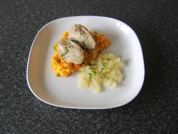 Pan seared partridge breasts on a bed of sweet potato and parsnip mash served with simple pear sauce