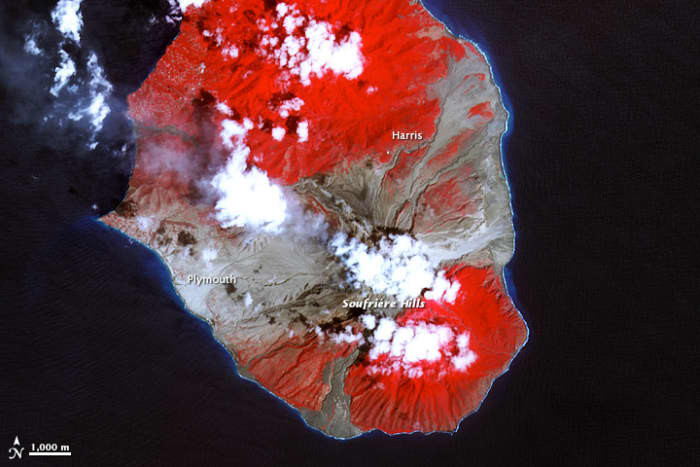 Southern half of Montserrat on March 17, 2007. Red: vegetated. White: clouds. Blue/black: ocean water. Gray: covered by flow deposits.