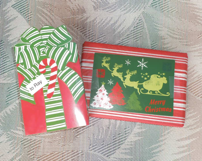 I've decorated these packages with last year's Christmas cards. They look festive and are easy to pack for shipping (no bows).