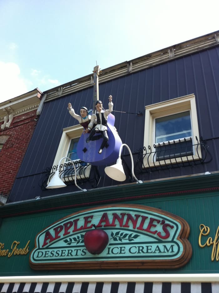This guitar was originally displayed on Mississauga St. then later hung above Apple Annie's (A store that has delicious homemade fudge along with other delightful treats)