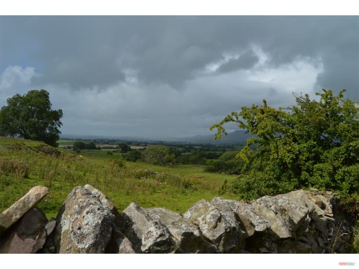 The rolling countryside around Consett, dry stone walling, pasture and extensive views west to the Durham Fell