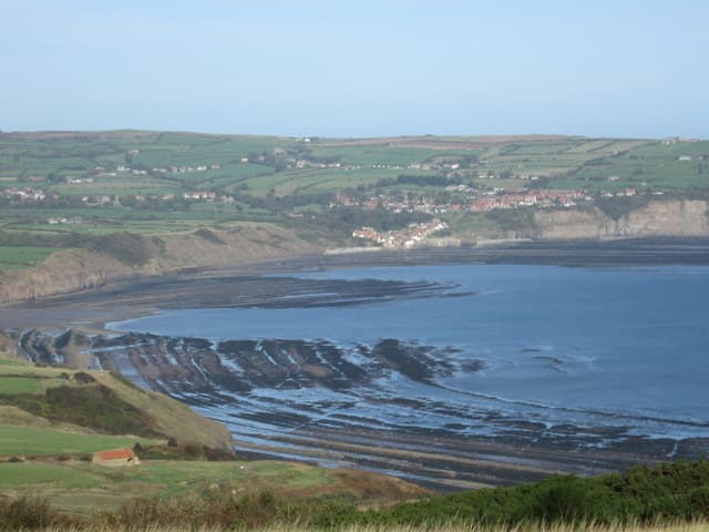 Robin Hood's Bay and Bay Town in the distance (Leo Walmsley's 'Bramblewick') seen from Ravenscar