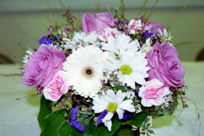 A special pot of blooms brings happiness to a woman on her special milestone birthday at any age.