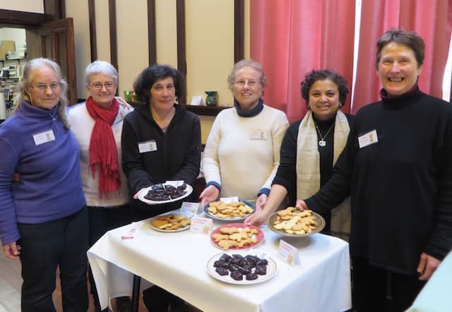 The author with other volunteers who baked a difference for Bikkie Day 2017 to raise funds for training dogs for the Blind Foundation of New Zealand organized under the auspices of the Theosophical Order of Service.