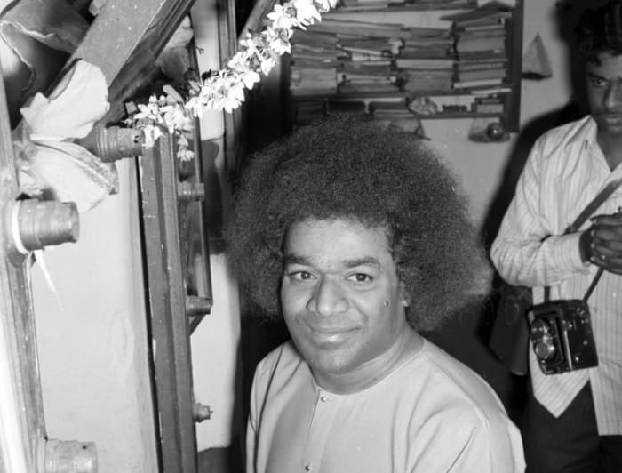 A rare photograph that my father treasures. He is seen here in the background holding his Rolleicord camera.
