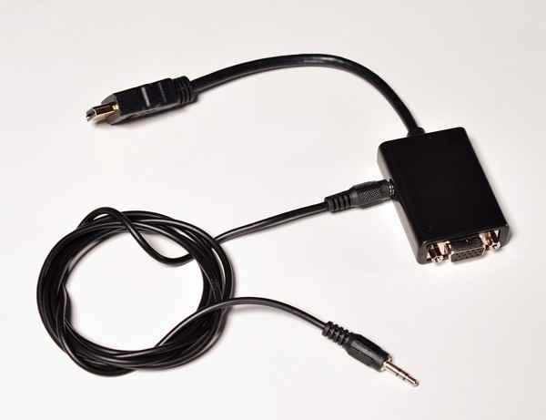 HDMI plug connector at one end and at the other end a DB-15 VGA with an audio jack on the side, this provides stereo from PC to the TV.