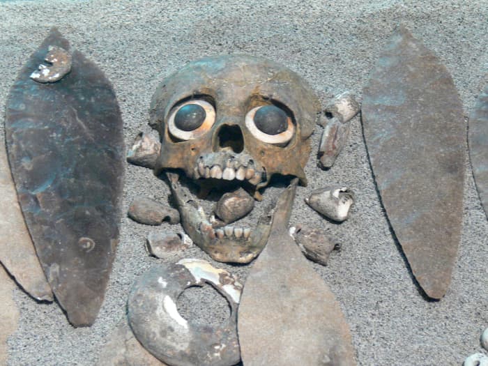 Child sacrifice ornament - to bring a better harvest? Many ways were sought to improve life, including ritual slaying of the prettiest, the handsomest, token kings. Druids were the real aristocrats, who ruled men's minds.