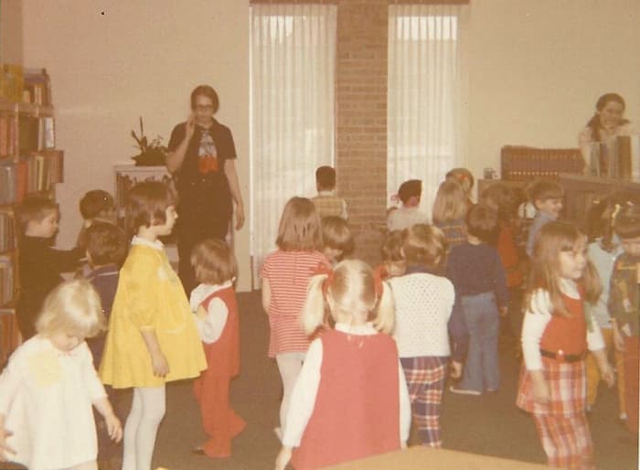 Here I am, leading a storytime stretching activity (back in my first years as a children's librarian). Smaller groups work better when making crafts.