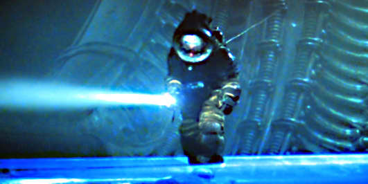 Kane investigates an extraterrestrial ship. The set for this sequence is imaginative yet forbidding. One can sense that something unpleasant lurks here