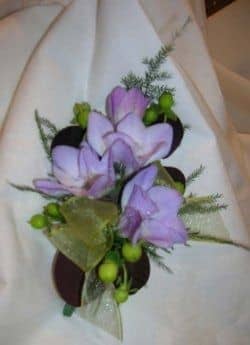 Floral tape holds this little corsage together and seals moisture in the cut ends of the stems.