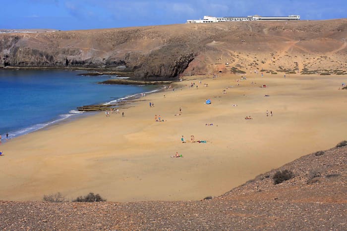 The view from Playa Mujeres back to the Sandos Papagayo Beach Resort Hotel which can be seen in the distance.