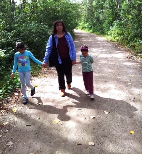 Gran and girls on a country road together. Reminds me of the John Denver song found here: Take Me Home, Country Roads (iTunes)