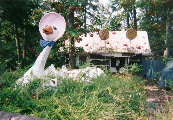 Mother Goose in an overgrown area in front of the Gingerbread house. She now resides at Clark's Eliok Farm.